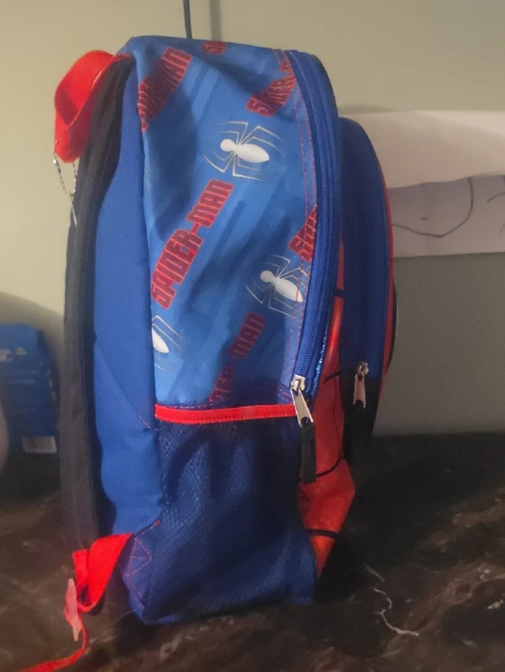 🚨 Spiderman Kids Red and Blue Backpack with Web Mask Graphic